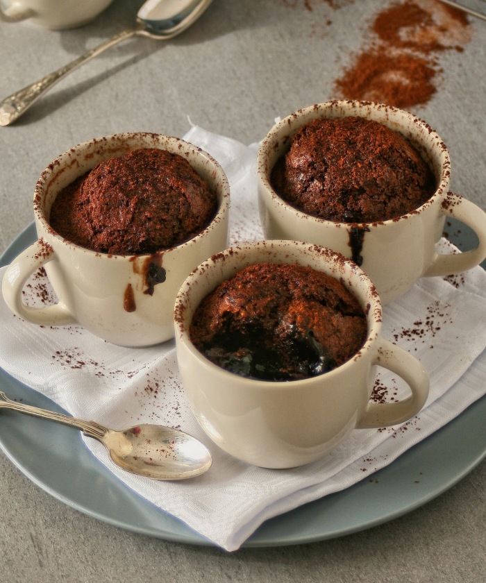 Baked saucy chocolate and coconut puddings. 