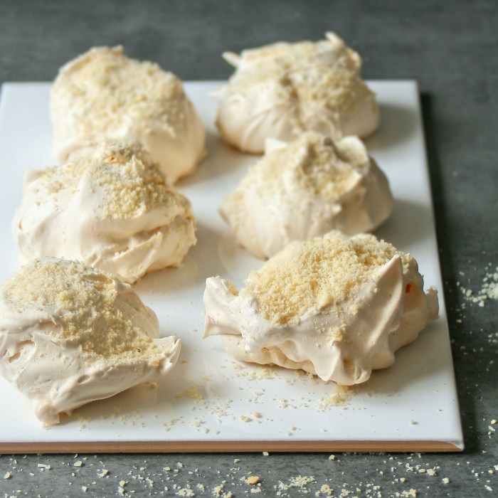 Vanilla meringues. Vanilla bean meringues topped with ground almonds,