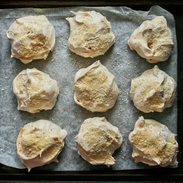 Vanilla bean meringues Aerial photo of vanilla bean meringues with almonds.
