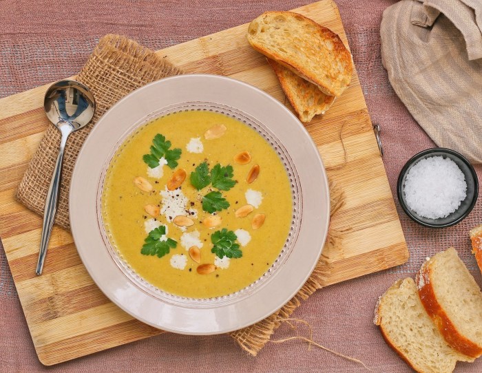 Creamy butternut soup Aerial shot of butternut soup with cream.
