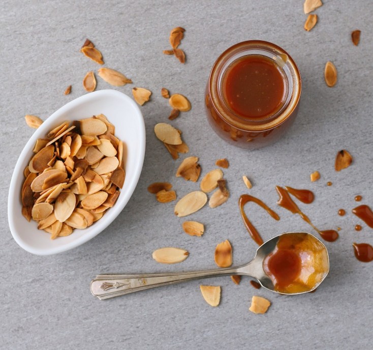 Caramel sauce and toasted almonds. 