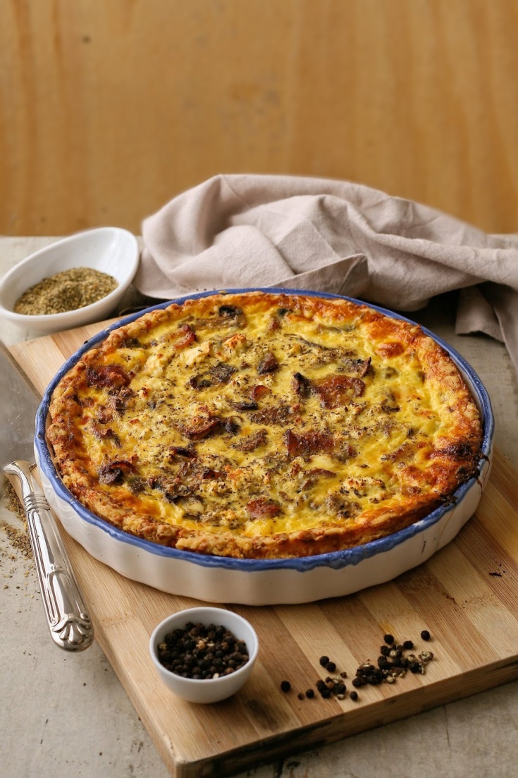 Bacon and mushroom quiche with cheese crust. 