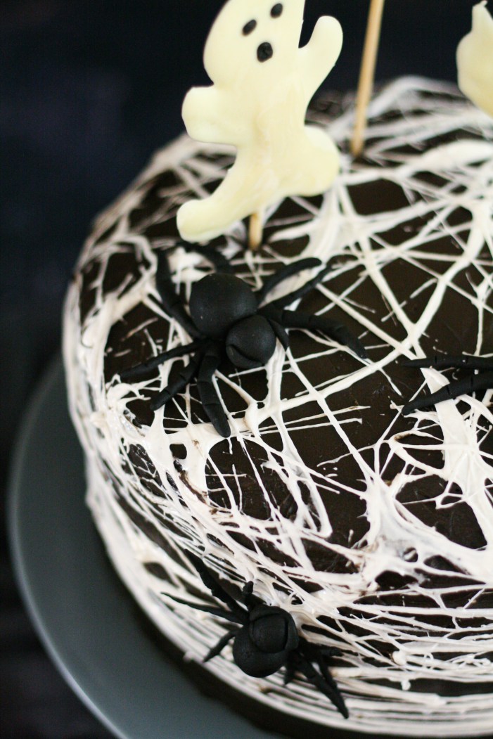 Spider web red velvet cake with chocolate cream cheese icing and chocolate ghosts