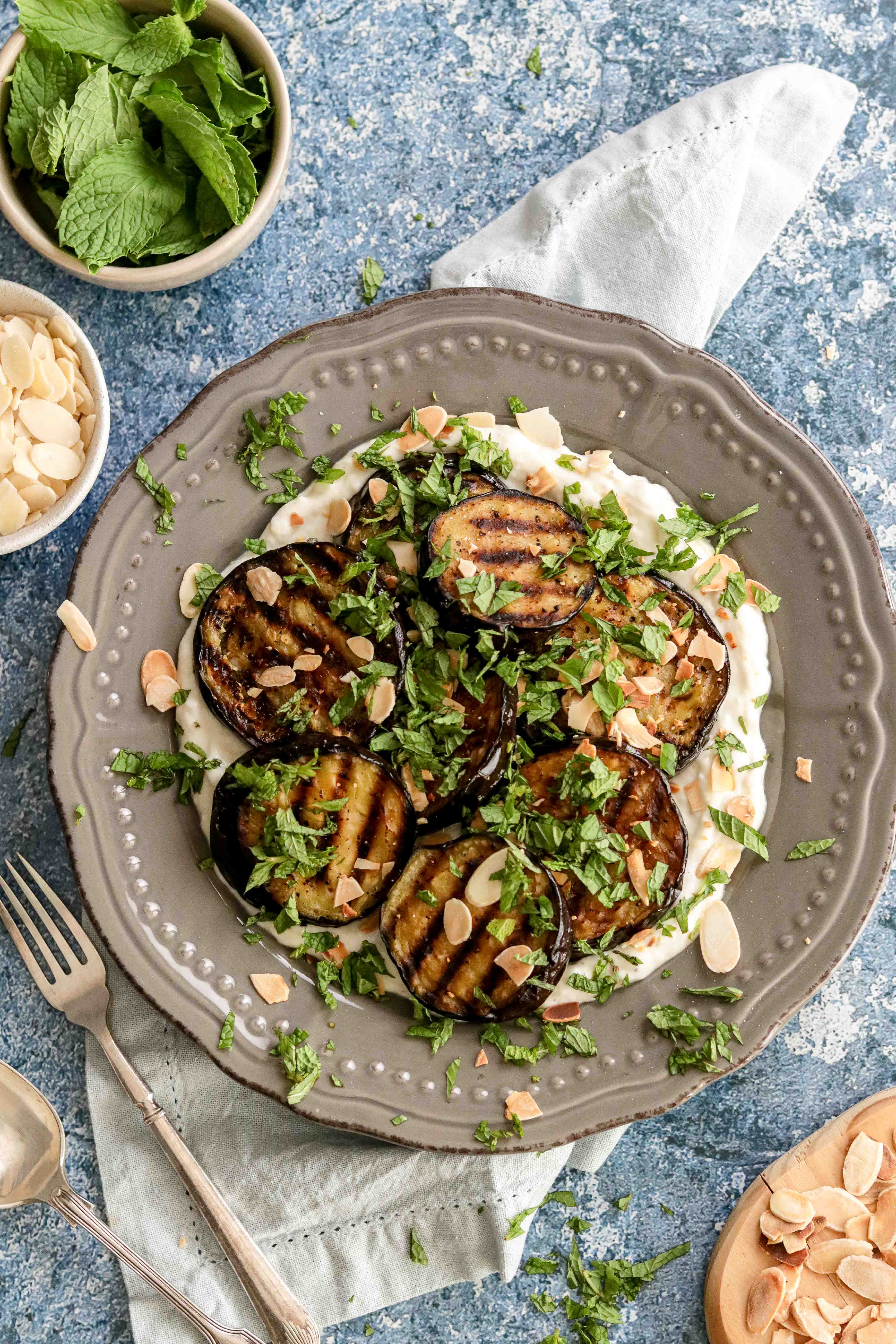 Top shot of a plate of grilled aubergine
